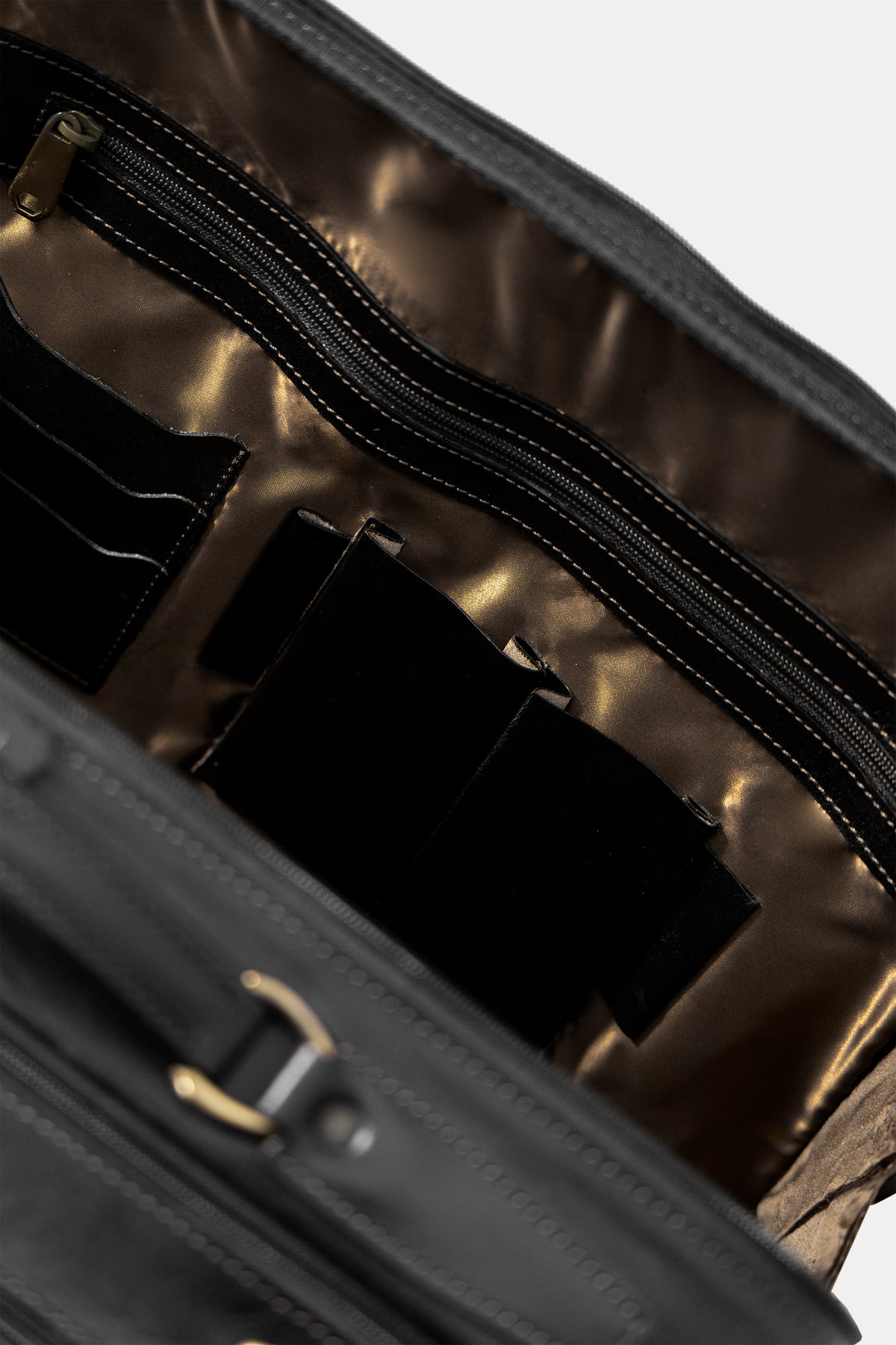 Leather trolley business bag in black, back view with trolley sleeve