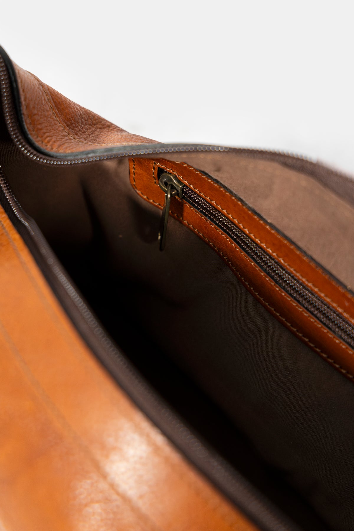 Leather wash bag in brown, interior view