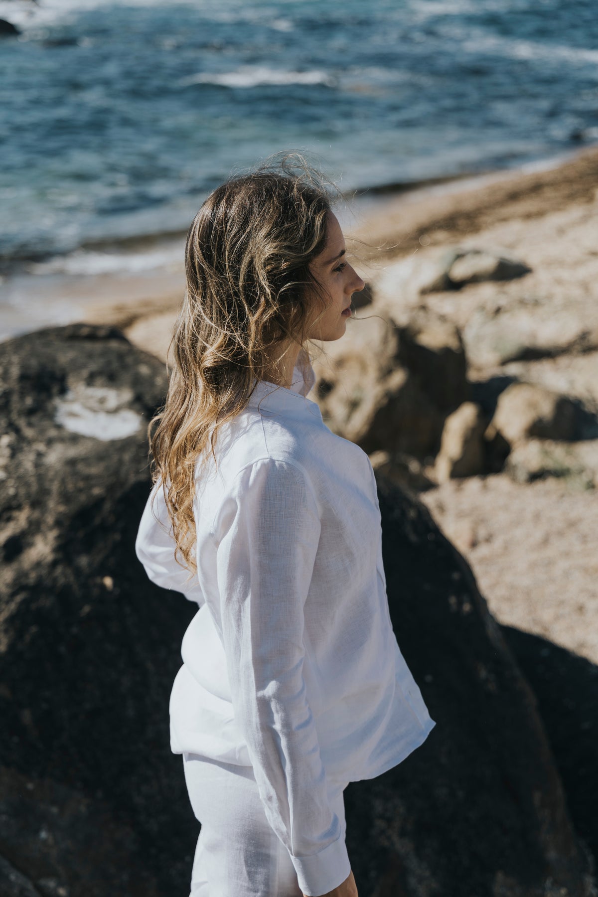 Linen blouse worn on the coast, D’Heritage Summer 2026