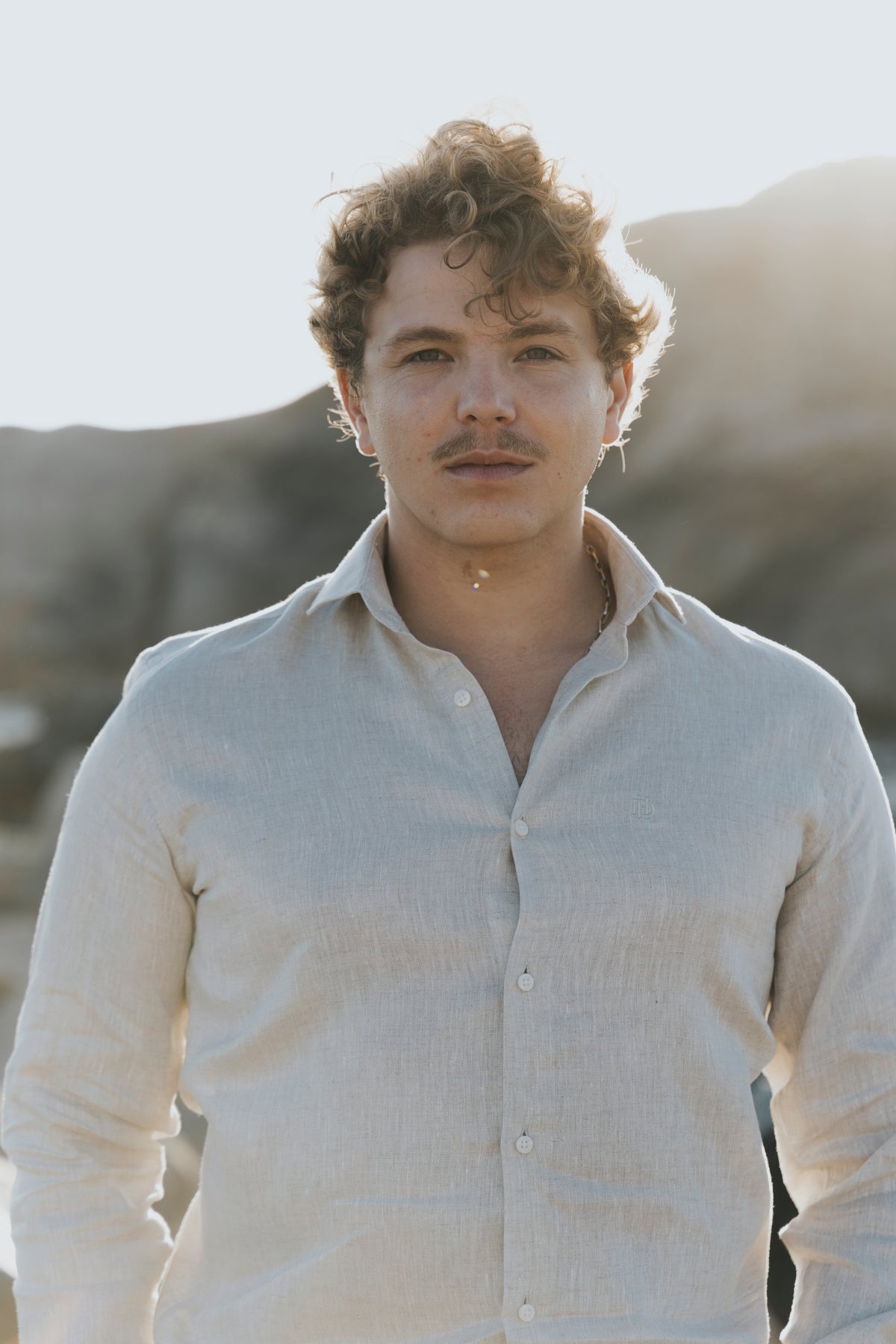 Men’s linen shirt worn by the sea, D’Heritage Summer 2026