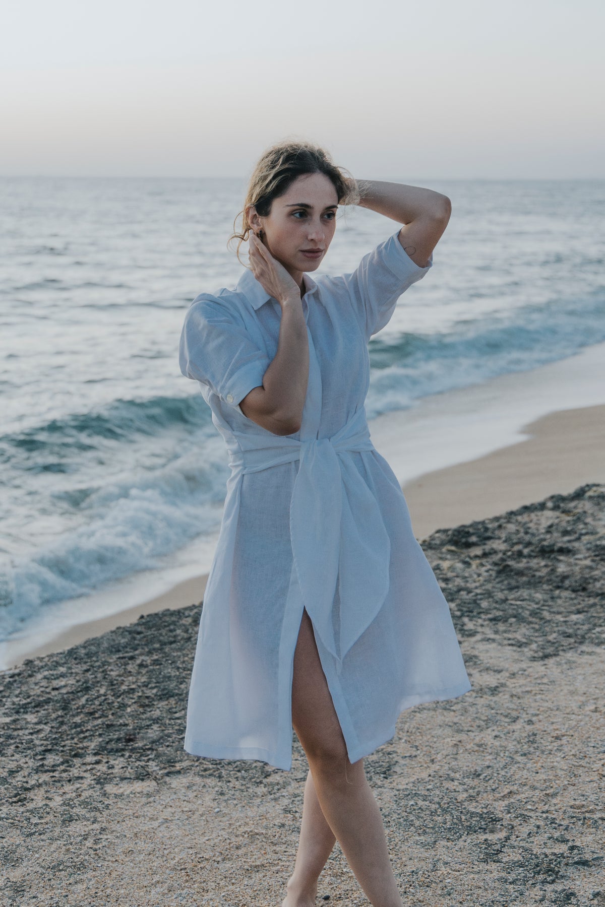 Linen shirt dress, detail of the collar and placket