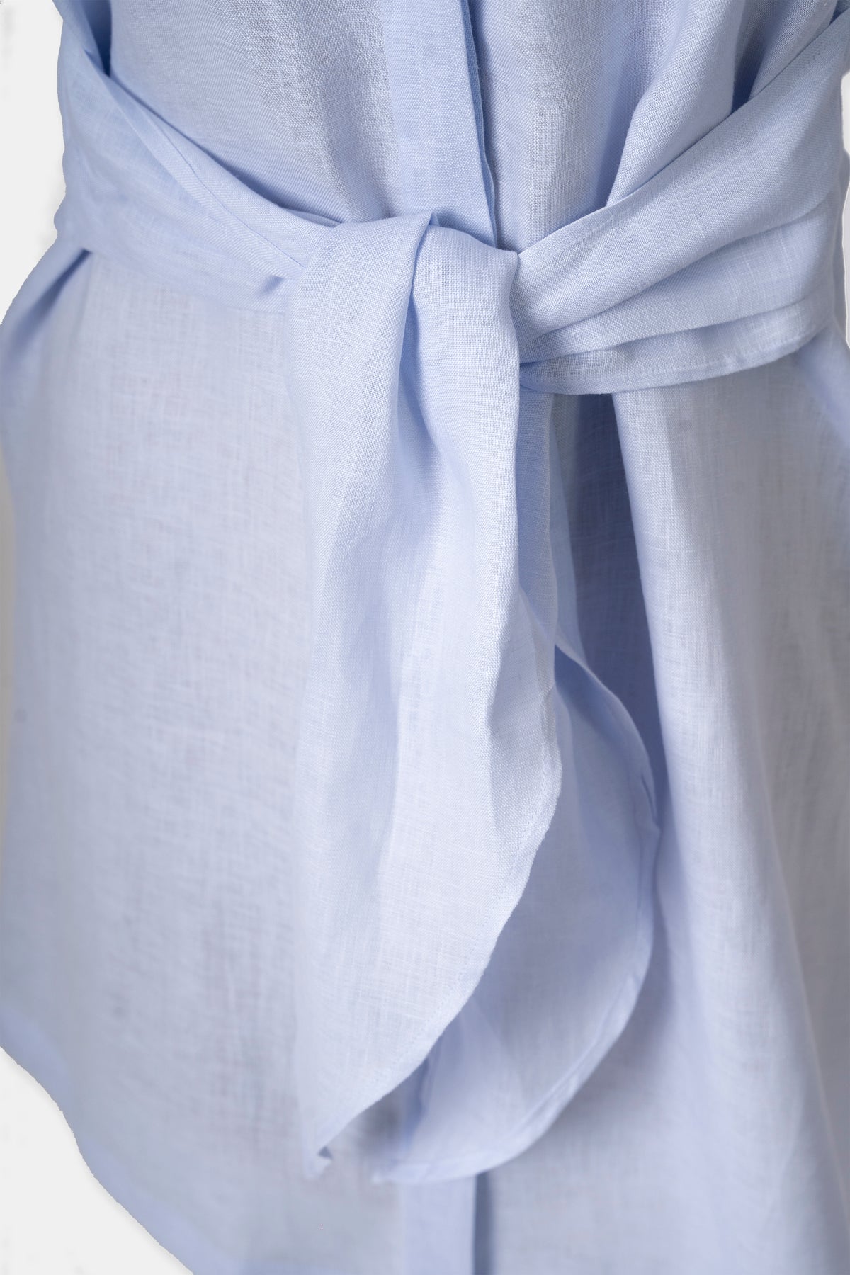 Linen shirt dress in pastel blue, back view