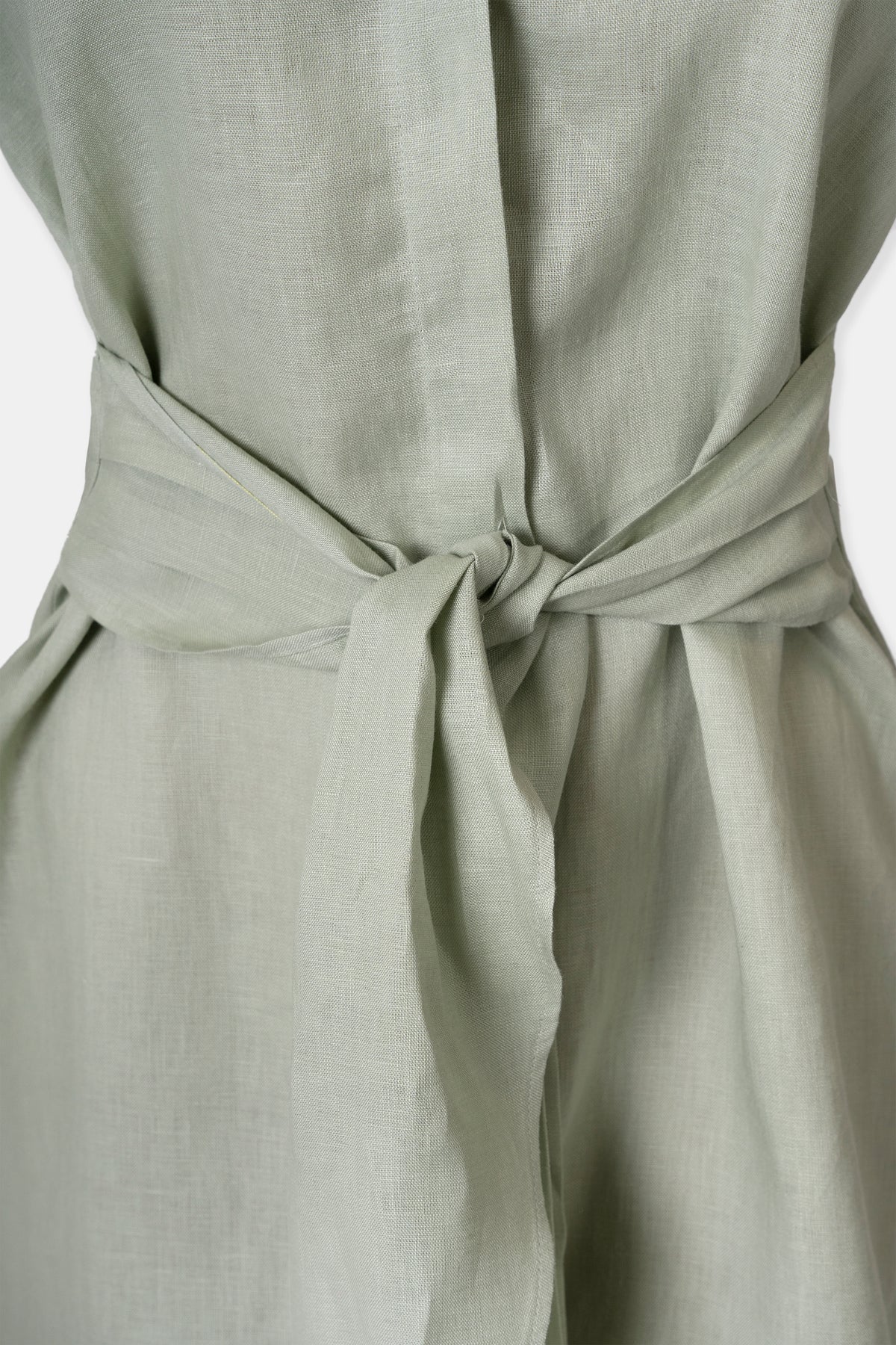 Linen shirt dress in sage green, back view