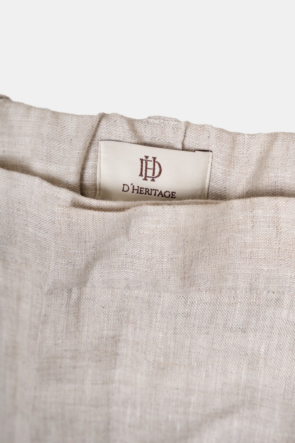 Men’s linen trousers in beige, back view