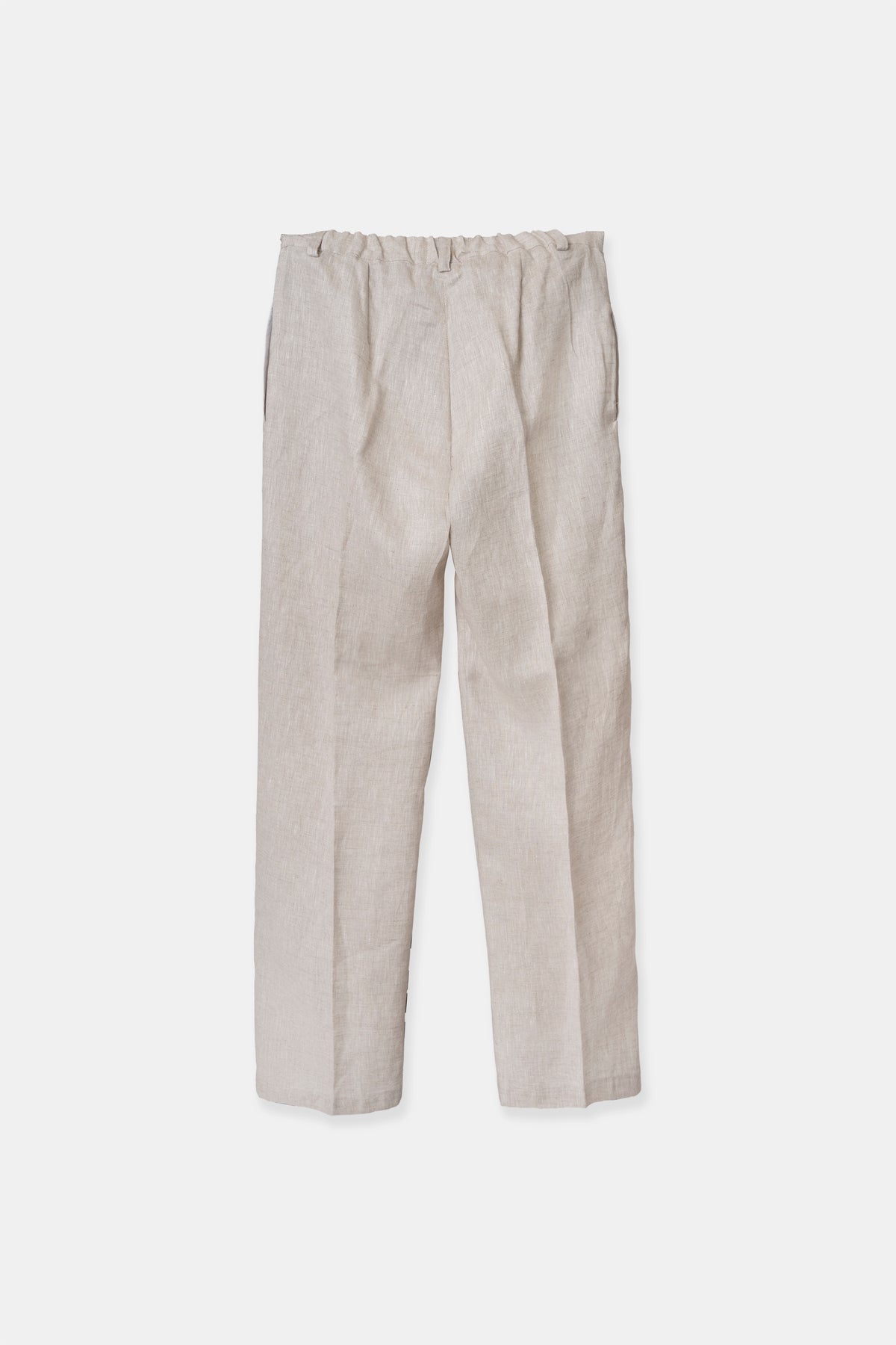 Women’s linen trousers in beige, side view