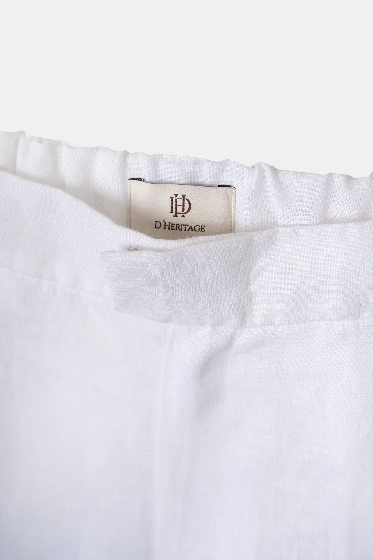 Women’s linen trousers in white, back view