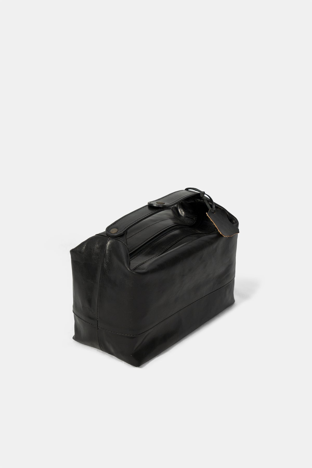 Leather wash bag in black, side view