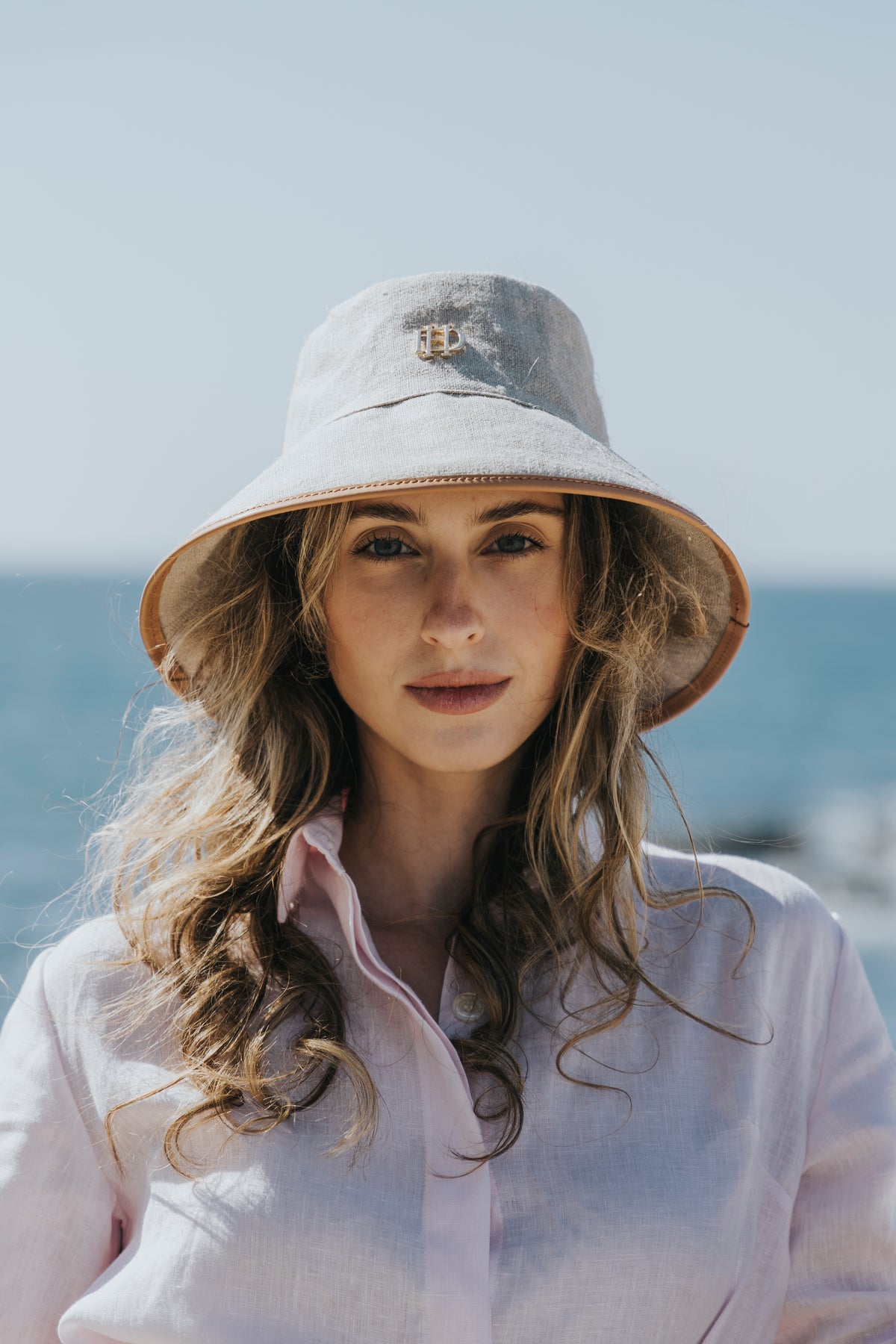 Linen hat styled with linen shirting, D'Heritage Summer 2026