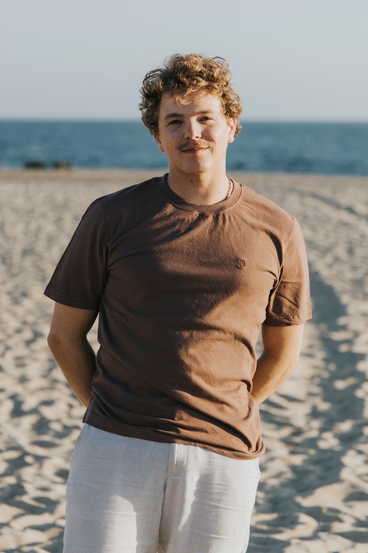 Peach-skin cotton jersey t-shirt worn on the coast, D’Heritage Summer 2026
