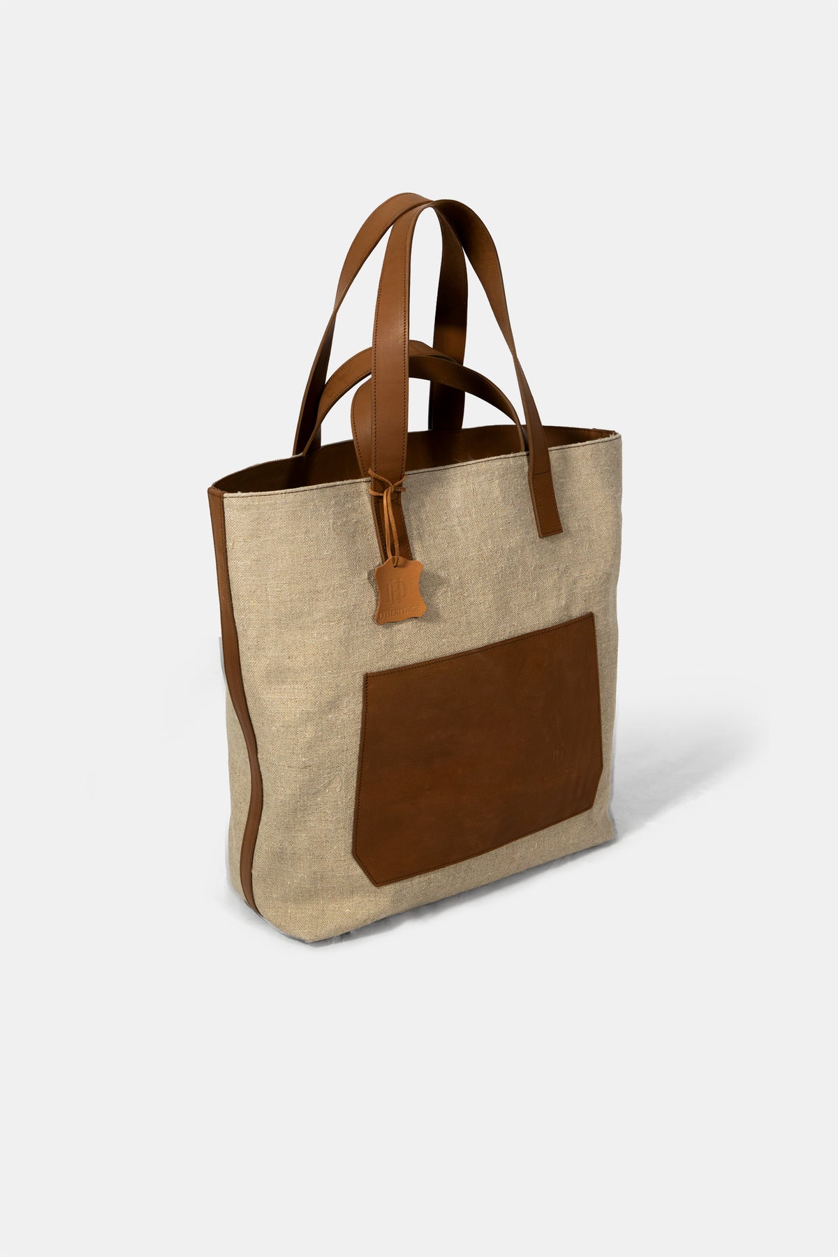 Linen and leather tote bag by D'Heritage, side view