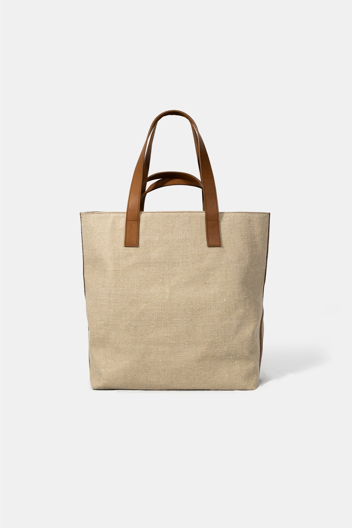 Linen and leather tote bag by D'Heritage, leather handle detail